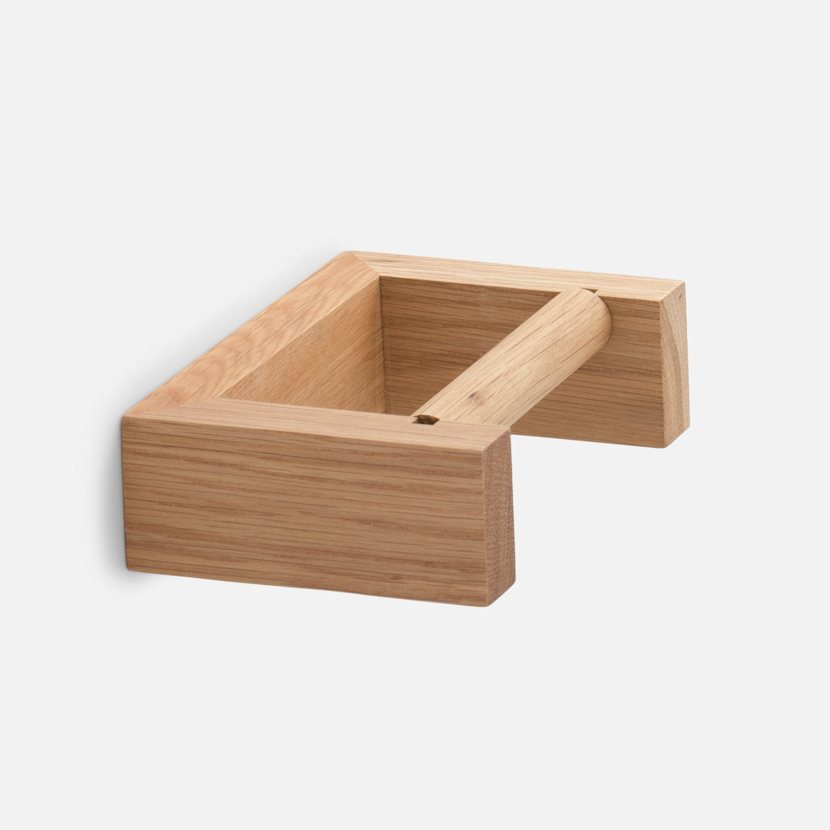 Close-up view of Oak Tissue Roll Holder showcasing its wooden roll bar and open box design against a white background