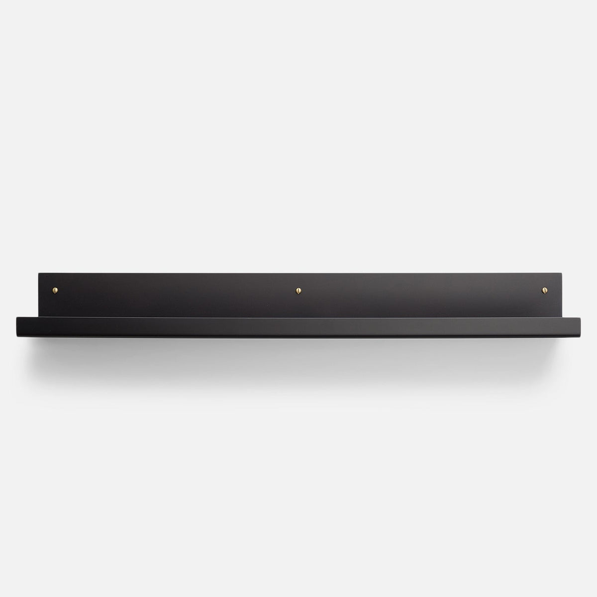 Front view of Brake Angle Picture Ledge in black satin showcasing brass mounting hardware with a white background
