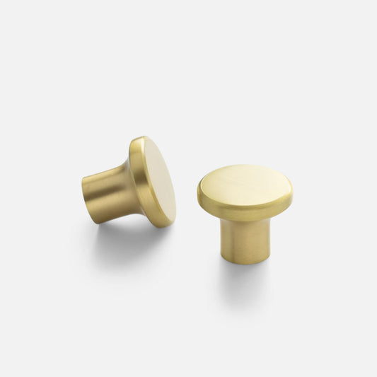 Two views of the Roland Cabinet Knob showcasing its solid-brass construction on a light gray background