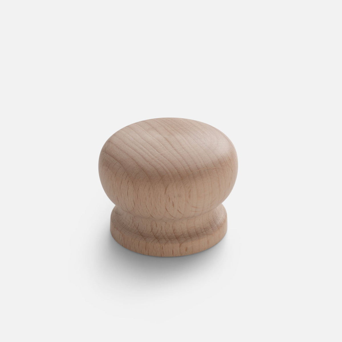 Front view of Turned Wood Knob showcasing natural wood grain with a light gray background