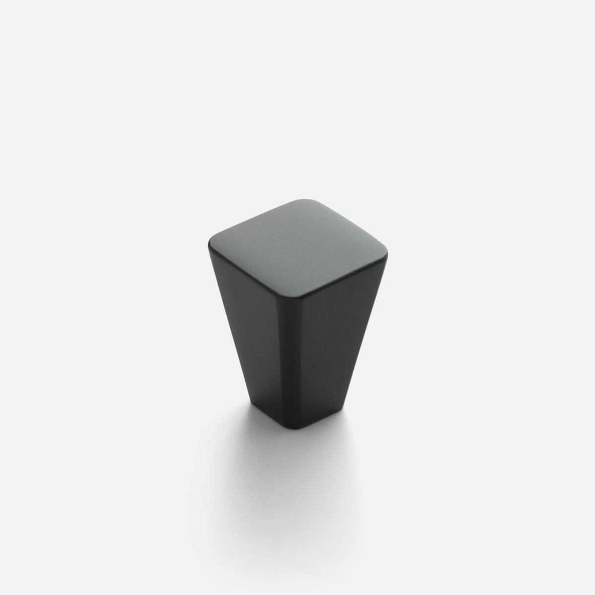 Front view of Truss Knob showcasing a tapered square design with a black finish on a light background