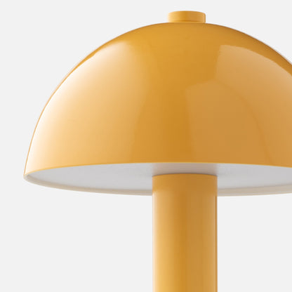 Close-up of Sidnie Portable Lamp showcasing its mushroom-shaped steel shade and stem against a light background
