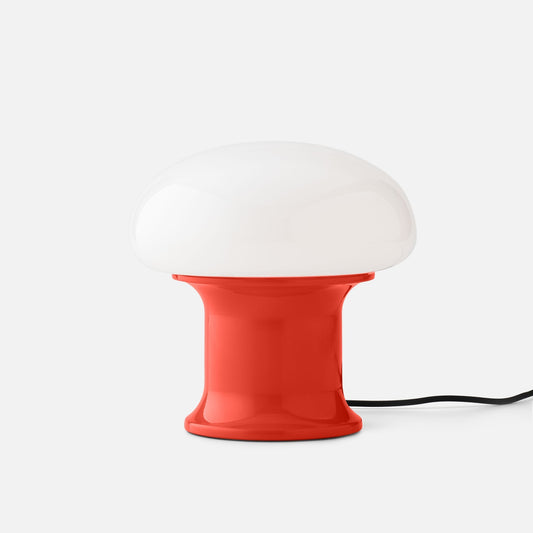 Front view of Rospo table lamp showcasing its Persimmon-Gloss steel base and opal glass shade on a white background