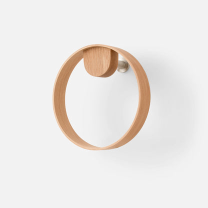 Front view of Oak Towel Ring showcasing a round oak ring and stainless steel mount against a white background