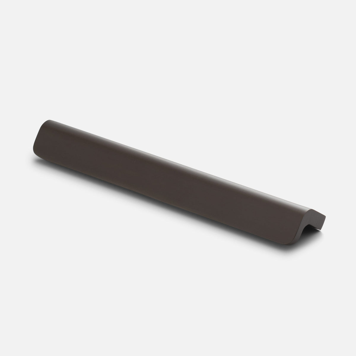 Angled view of Moore Pull showcasing its soft curved solid brass design in oil rubbed bronze with a white background