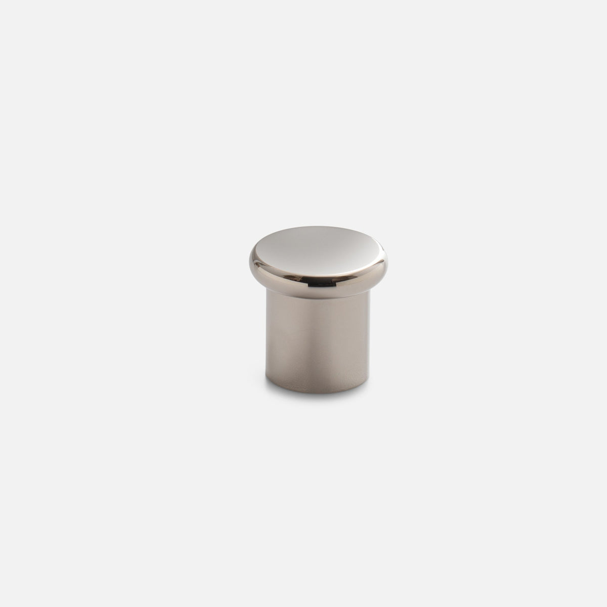 Front view of Remy Knob showcasing its rounded solid brass construction and soft curves against a white background