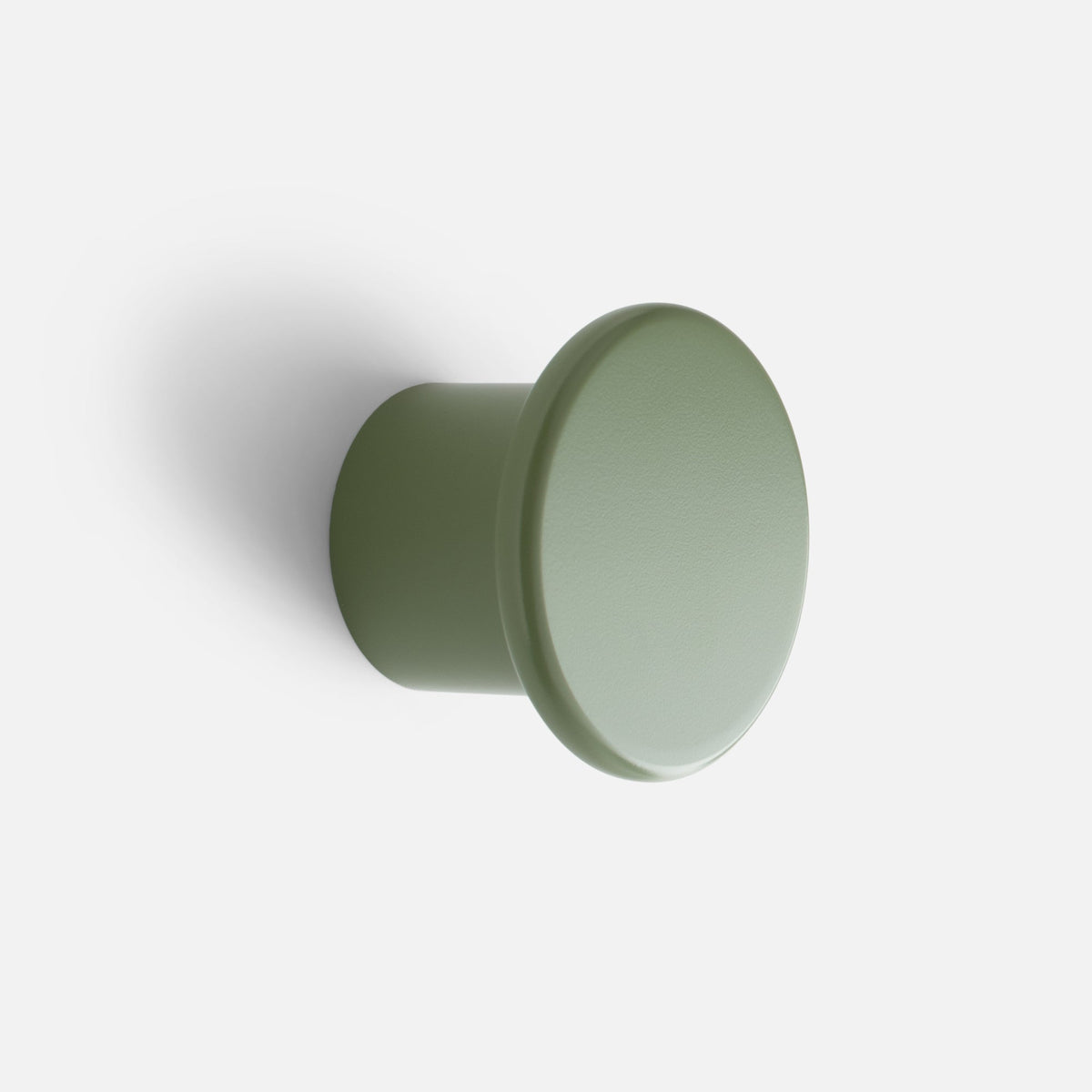Angled view of Remy Single Hook showcasing its cylindrical form on a white background