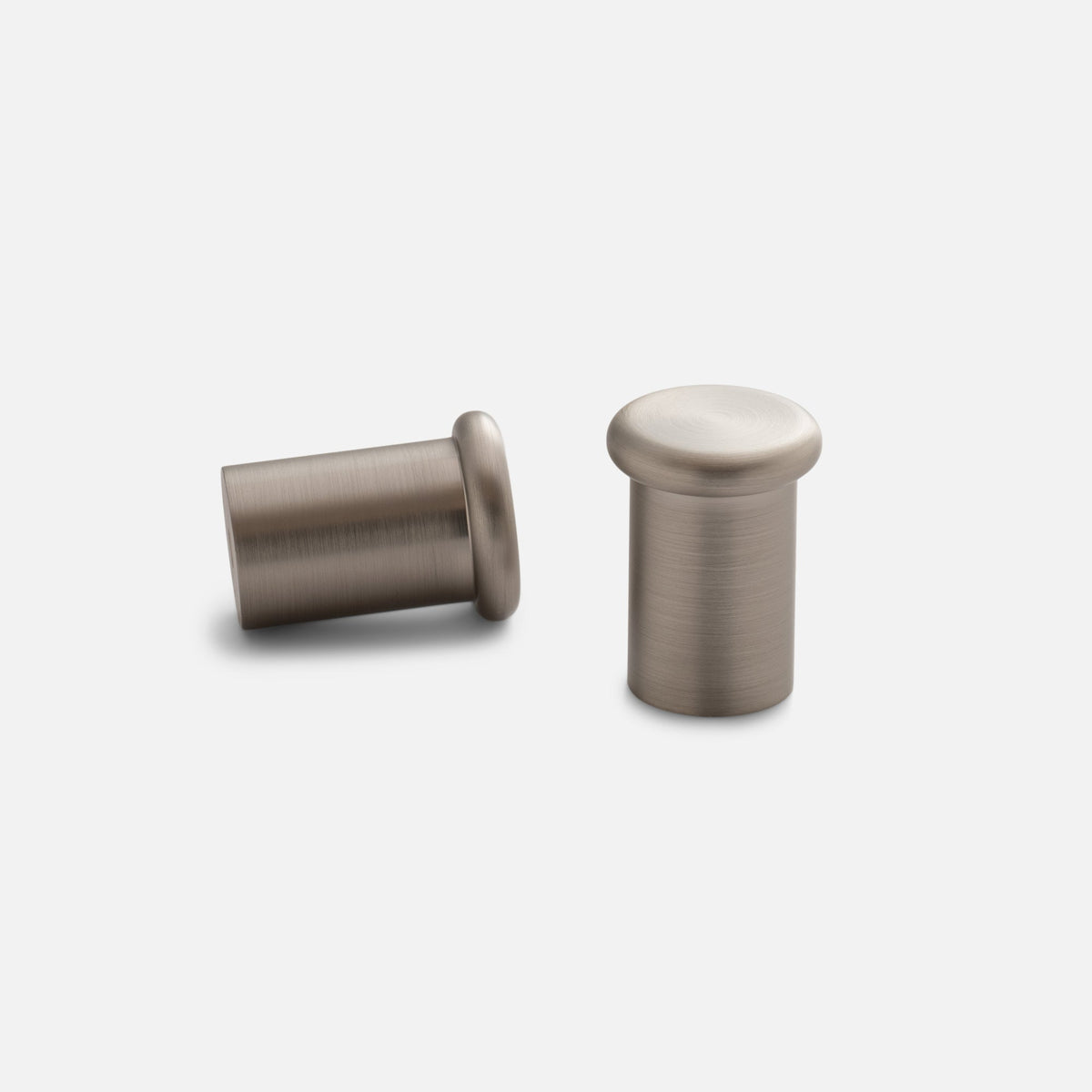 Side and front views of Remy Single Hook showcasing its cylindrical form with a light gray background