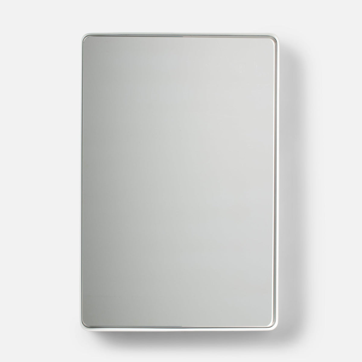 Front view of Leo Mirror showcasing a white rounded rectangular frame against a light background
