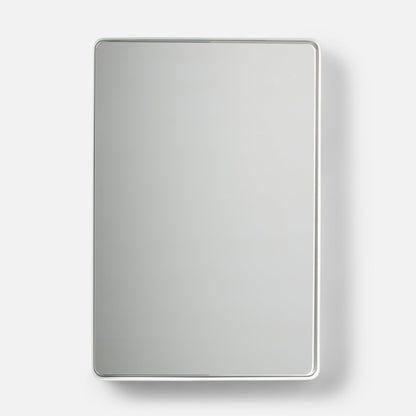Front view of Leo Mirror showcasing a white rounded rectangular frame against a light background