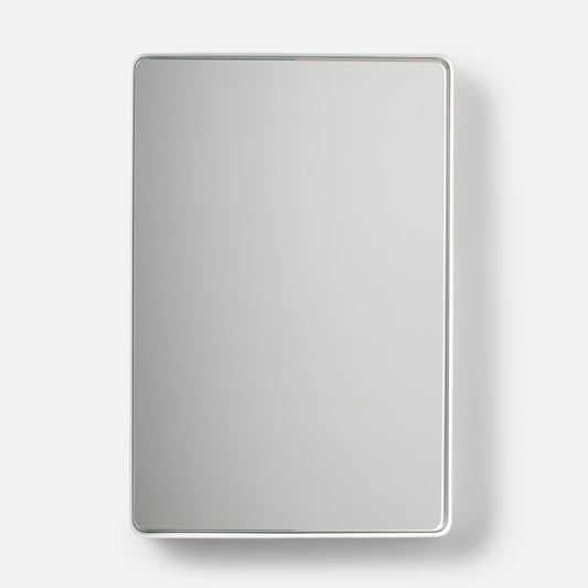 Front view of Leo Mirror showcasing a white rounded rectangular frame against a light background