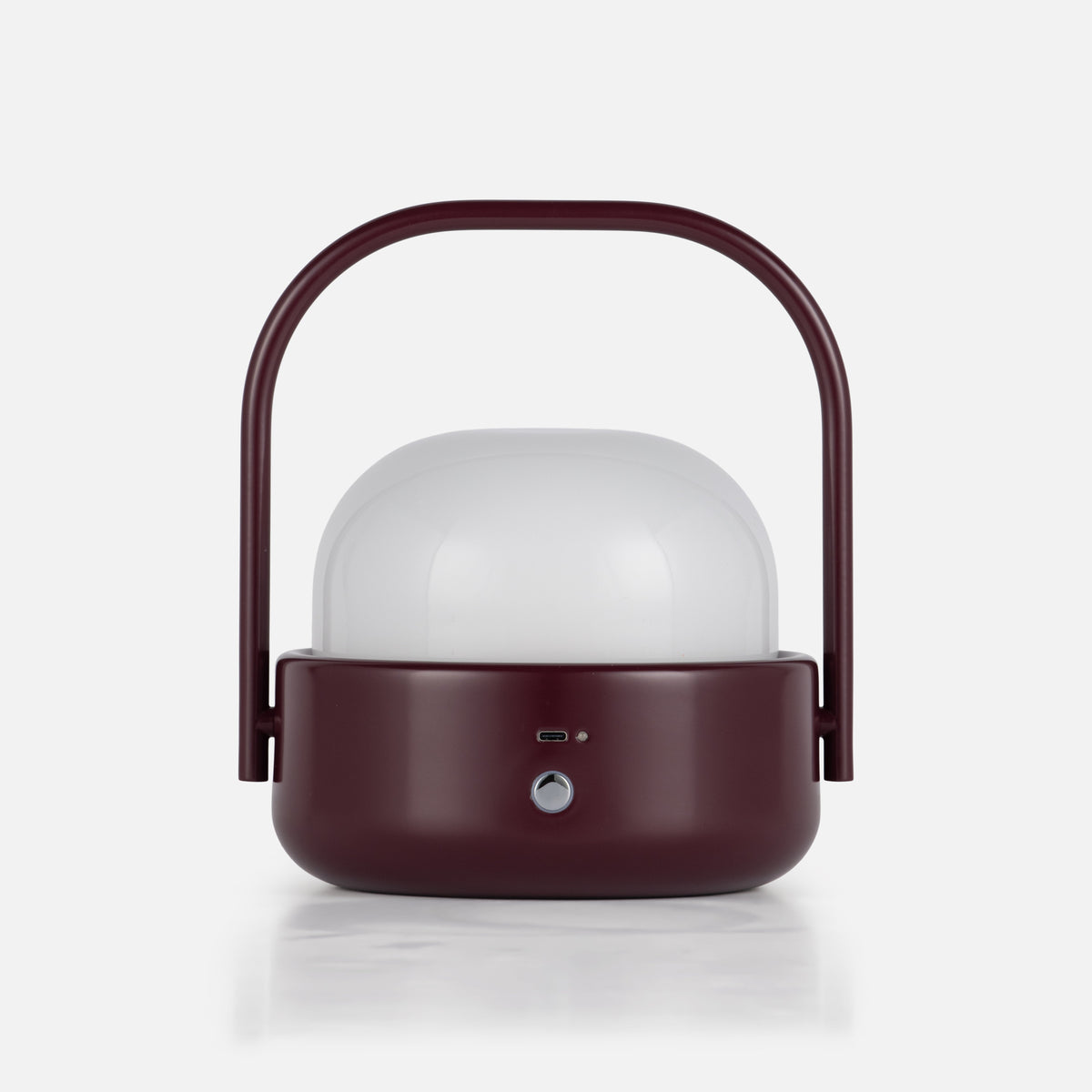 Front view of Cooper Table Lamp showcasing a deep burgundy finish, white diffuser, arched handle, and front controls on a white background