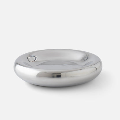 Three-quarter view of Schoolhouse x Clare V. Yves Cast Metal Catch-All showcasing its rounded aluminum dish with a light gray background