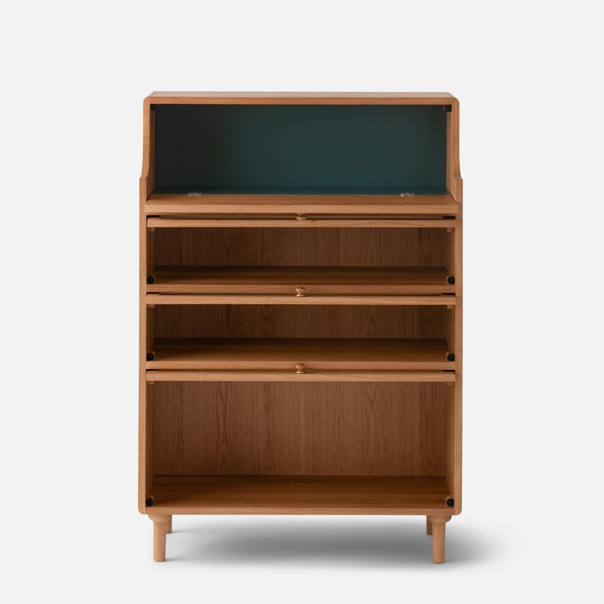 Front view of Peggy Cabinet showcasing warm wood finish, open shelving, and tapered legs against a light background