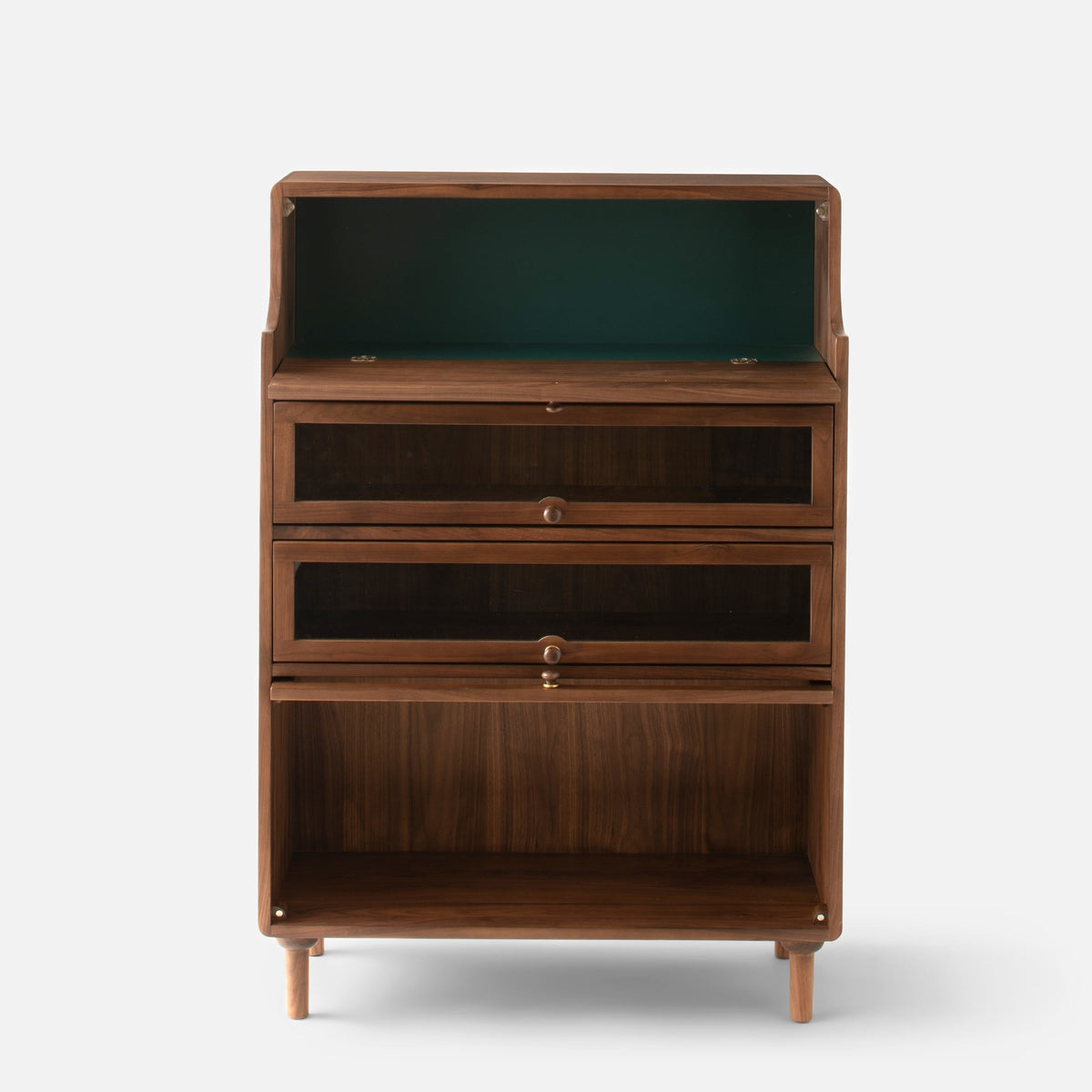 Front view of Peggy Cabinet showcasing open shelving, two drawers, lower storage compartment, and tapered legs on white background