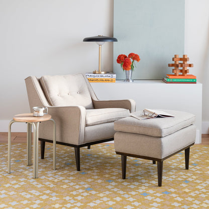 Room view of Sundrop Hand-Knotted Rug showcasing graphic tossed flowers on chartreuse wool in a living room