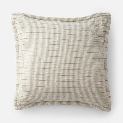 Close up of Diamond Ticking Quilted pillow sham showcasing diamond quilting and olive green horizontal stripes on white background