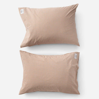 Top-down view of Gingham Pillowcase Set showing two pillowcases with russet gingham check pattern on white background