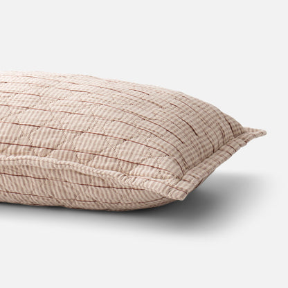 Angled close-up of Diamond Ticking Quilted Pillow Sham showing diamond quilting and piped edge on white background